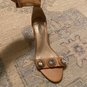 Heels with sparkle studded details